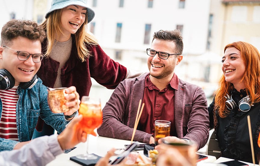 friends-having-fun-drinking-at-open-air-bar-after-2022-01-19-00-00-09-utc